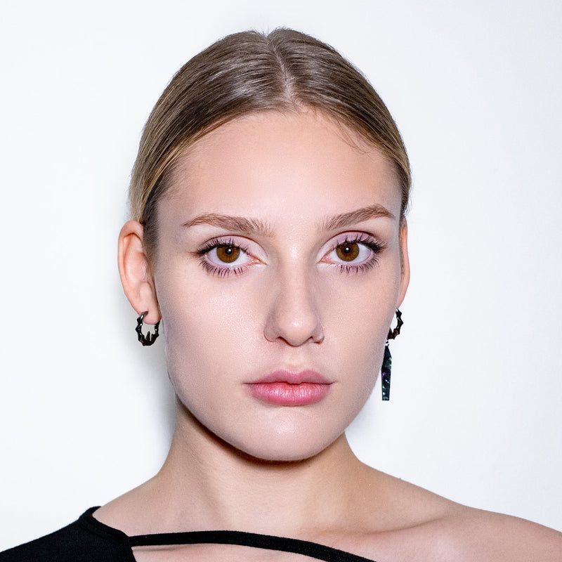 CHIKHAI ASYMMETRICAL HOOP – DARK COSMIC DROP - MUST