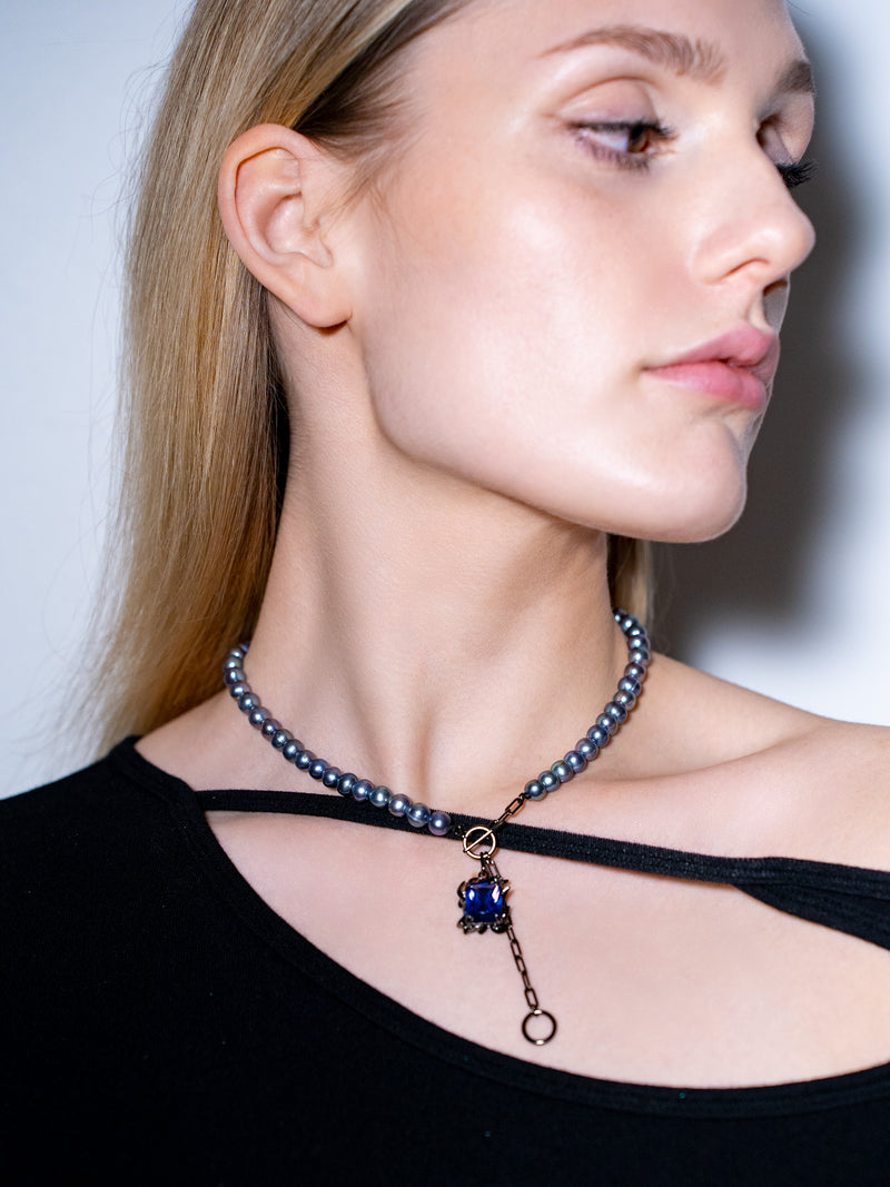 ORPHEUS BLACK PEARL NECKLACE WITH MIDNIGHT BLUE GEM
